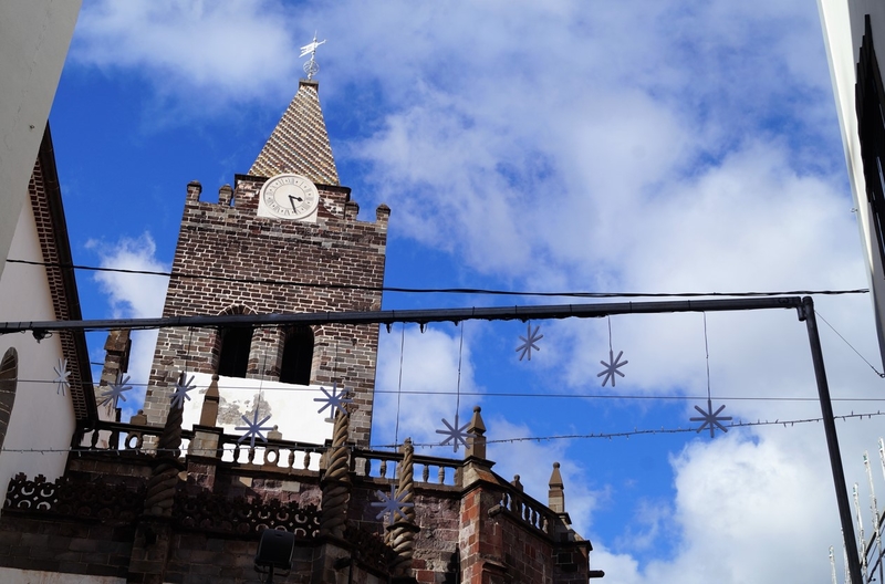 Square stone bell tower of Funchal Cathedral